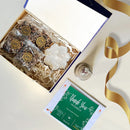 Luxury Diwali hamper with lotus candle, almond brittle chocolate, and festive Diwali card