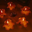 Decorative candles with a Diwali-themed background