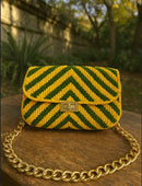  macrame bag with floral detail and metal chain strap