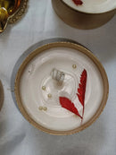 Candle with floral decor in jar urli 